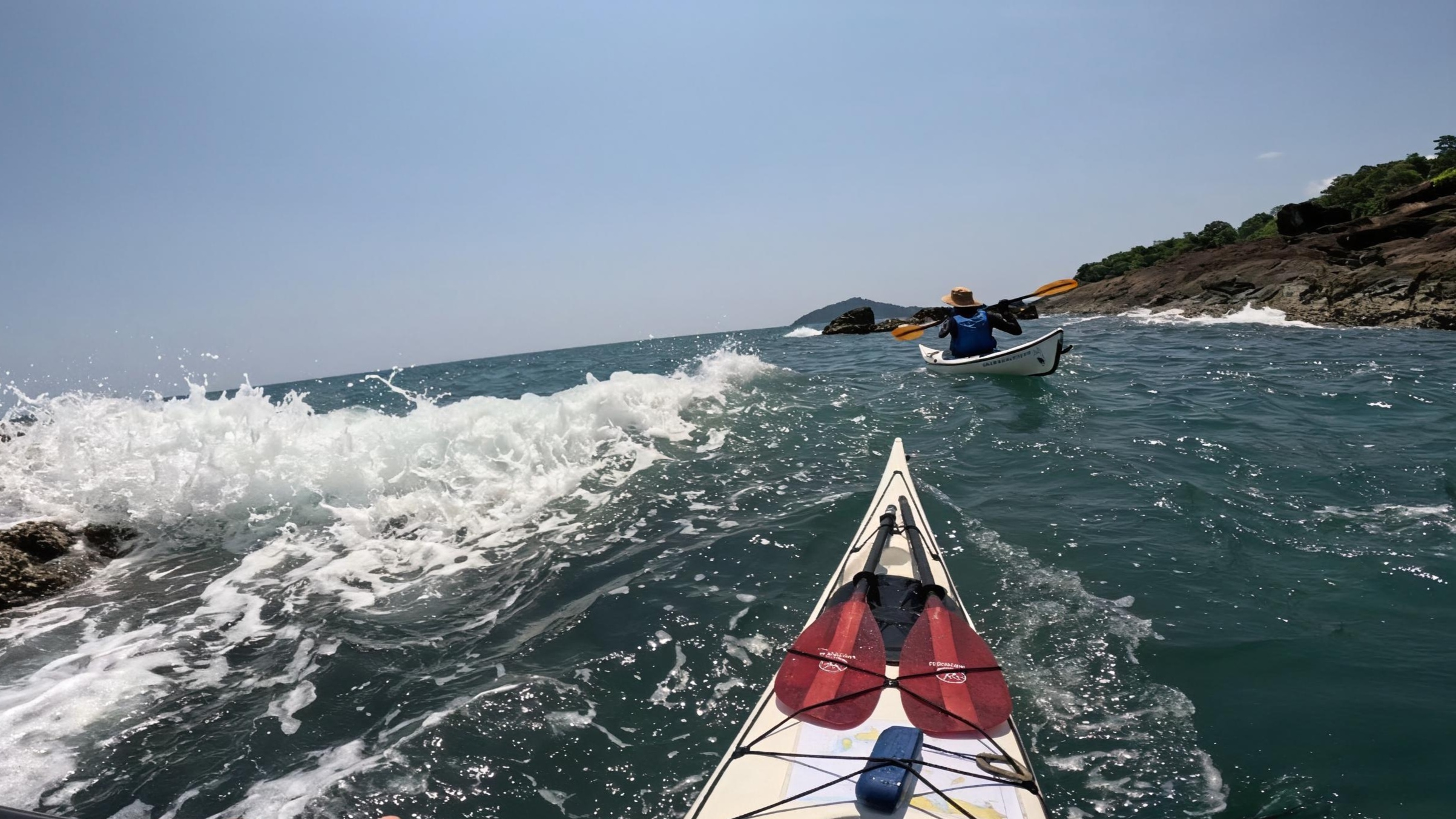 Sea kayaking along the southeast coast of Koh Chang, Thailand