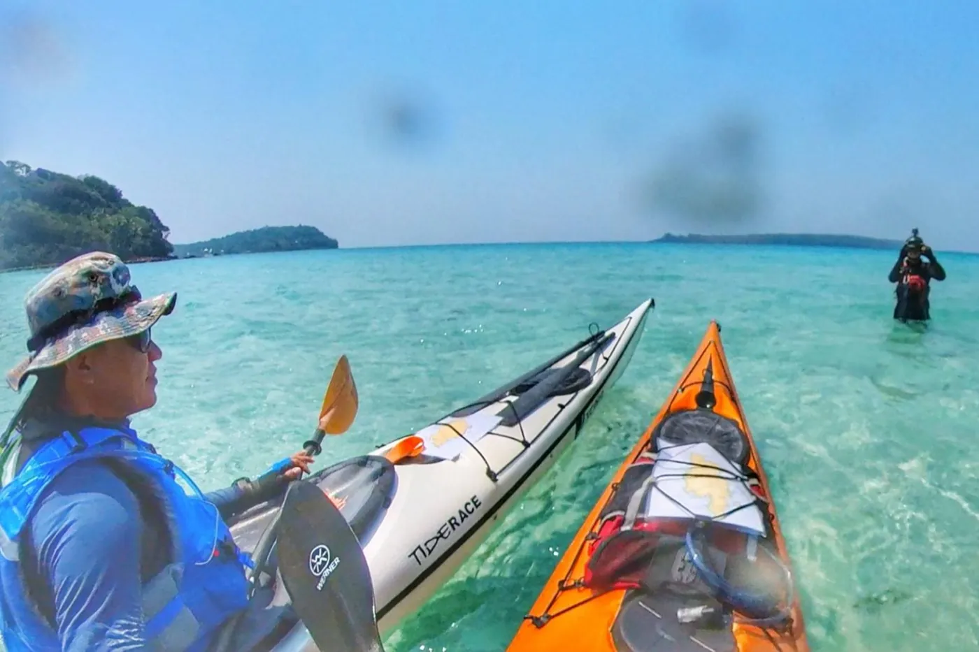 sea-kayaking-koh-chang-paddler-turquoise-lagoon